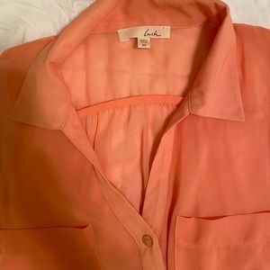 Coral blouse with color no sleeves